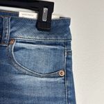 American Eagle  Midi Super Stretch Denim low rise Jean Shorts fringe hem size 0 Photo 4