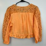 American Eagle NWT  Sherbet Orange Crochet Cropped Ruffle Tie Blouse Size Small Photo 1