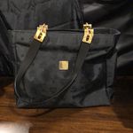 MCM  Black and Gold Monogram Shoulder Bag with Top Zipper Closure Made In Germany Photo 3