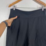 CAbi  High Rise Pleated Pull On Cropped Pants Black Medium Modern Minimalist Photo 7