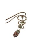 Rose gold and gold toned circle mosaic necklace and stone pendant Photo 3