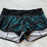 Lululemon speed short palm leaf teal and black with built in panty size 8 Photo 3