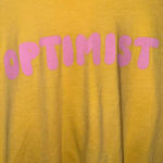 Optimist Yellow long sleeve tee with pink lettering Size M Photo 1