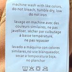 We Wore What ‎ Nylon Biker Short in Gold Photo 7