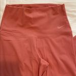 Nike High-Waisted Salmon-Colored Leggings Photo 1