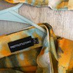 Pretty Little Thing orange tie dye corset and midi skirt set Photo 1