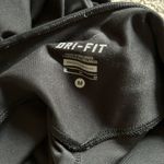 Nike  Women's Black Dri-FIT leggings size medium Photo 3