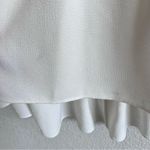 Tibi  Savanna Crepe Long Sleeve Peplum Top Photo 6