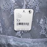 Free People  Ready Now Cross Back Lace Mini Slip Dress Photo 9