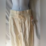 Open Edit  | Ivory rayon wide leg smocked waist drawstring palazzo pants Photo 3