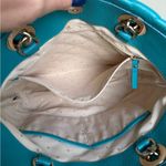 Kate Spade New York quilted tote bag in teal. Photo 6