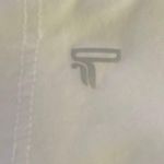 Fabletics -DEMI LOVATO, white top Photo 8