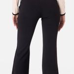 Adika Black Lace Up Side Flare Pants Photo 3