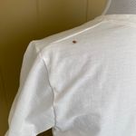 Under Armour women L heat gear loose fit v-cut short sleeve top white Photo 4