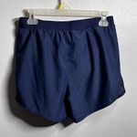 Under Armour  Women Navy Blue Loose Fit Athletic Heat Gear Shorts Size M. Photo 7