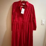 ZARA  WOMAN COLLECTION Midi dress made of 100% cotton. Lapel collar and long cuffed sleeves. Adjustable tied self belt. Tonal embroidered eyelet detail. Front button closure. Red | 8420/916/600 Photo 4