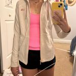 The North Face Cream Zip-up Jacket Photo 0