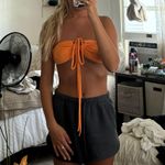 Orange Teri Cloth Halter Crop Photo 1