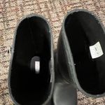 Hunter Boots Black Hunter rain boots #rainydays Stylish black rain boots by Hunter. Durable and waterproof. Perfect for wet weather. Photo 3