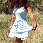 Light blue ruffled tiered smocked strapless romper Photo 4