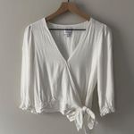 Koko + Mason White Cropped Wrap Top 3/4 sleeve snap v Photo 0