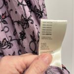 Free People  Purple Smocked Tie Front Jumpsuit‎ Photo 6