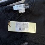 Never Fully Dressed Photo 5