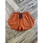 Alphalete  Woman’s Infinity Stride Short W/ Liner - Sour Tangerine, Size Medium Photo 2
