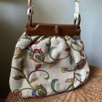 Vintage Floral Embroidered Fabric with Wooden Frame Photo 0