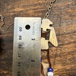 Feathered dreamcatcher earrings with Beaded Accents and a silver thunderbird Brown Photo 8