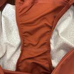 Athleta Run With It Printed 3.5" Shorts XS Cheetah Rust Orange Photo 3