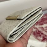 Gucci  Embossed  Leather Compact Wallet Photo 4