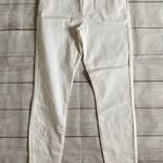 Celebrity Pink Mid Rise Cream Colored Skinny Jeans with Classic Denim Texture Photo 0