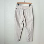 Athleta endless high rise cargo pants cream NWOT 10 Photo 8