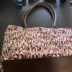 Blush tote in large.  Perfect for the beach. Zipper pocket inside.  GUC. Photo 2