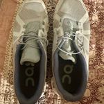 on cloud On Running Light Gray Athletic Shoes Photo 0