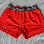 Under Armour Women's Vibrant Red Athletic Shorts Photo 0
