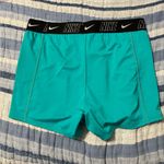 Nike NWT  Women Fusion Logo Tape Kickshort medium Photo 5