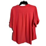 Vibrant PerSeption Women's coral blouse, size 1X, features a stylish 1/4 Photo 1