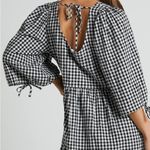 Showpo ROSITA MINI DRESS - TIE FRONT PUFF SLEEVE DRESS IN BLACK AND WHITE CHECK Photo 1
