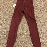 Lululemon  power thru 25” legging size 4 red merlot Photo 0