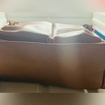 Brown patent leather diaper bag with multiple pockets and key holders Photo 4