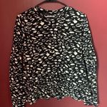 Dolce Vita Leopard Peplum Top | Medium Photo 0