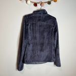 The North Face  indigo Osito asymmetrical snap sweatshirt Photo 4