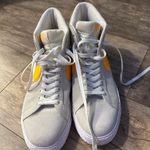 Nike Gray and Yellow Sneakers with Classic Swoosh Photo 0