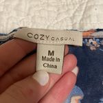 Cozy Casual Sheer Navy Blue Floral Swimsuit Coverrup Photo 2