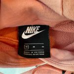 Nike  Women's Medium Pullover Hoodie - Light Pink with White Swoosh Photo 3