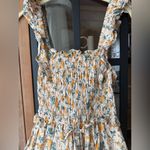 Tuckernuck Ella Blu eyelet floral smocked mini dress tiered ruffle sleeveless marigold Photo 2