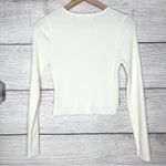 White Ribbed Long Sleeve Crop Top with Rhinestone Heart Detailing Size Medium Photo 8