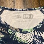 Reel Life  blue and green leaf pattern rash guard size Large Photo 1